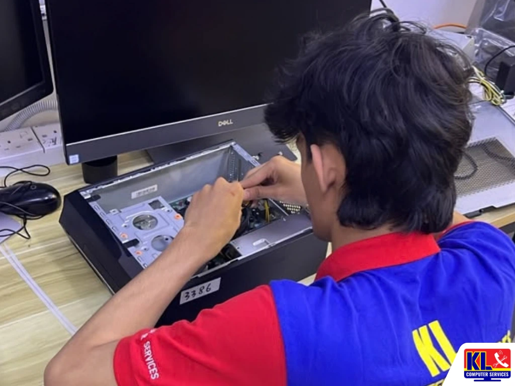 PC won't turn on - technician diagnosing a desktop computer at KL Computer Services
